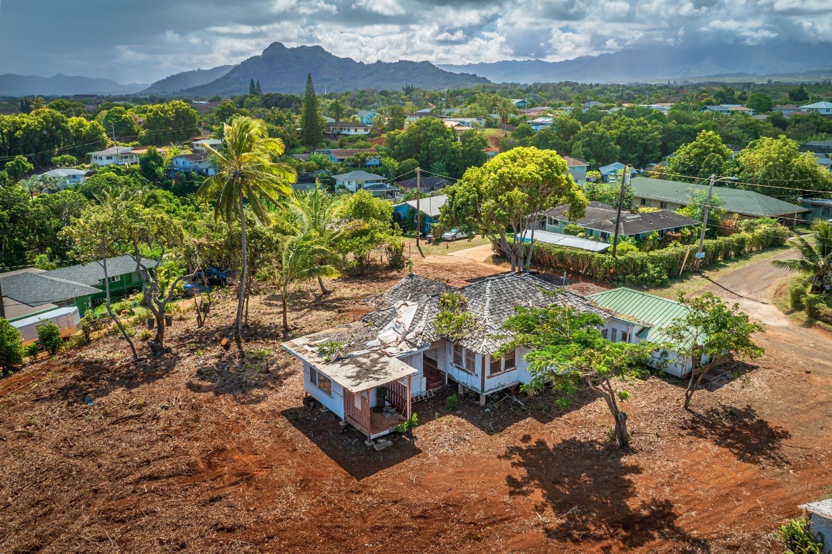 4964 La Road Kapaa, HI 96746 - Photo 3 of 18 a view of a city with lawn chairs under an umbrella