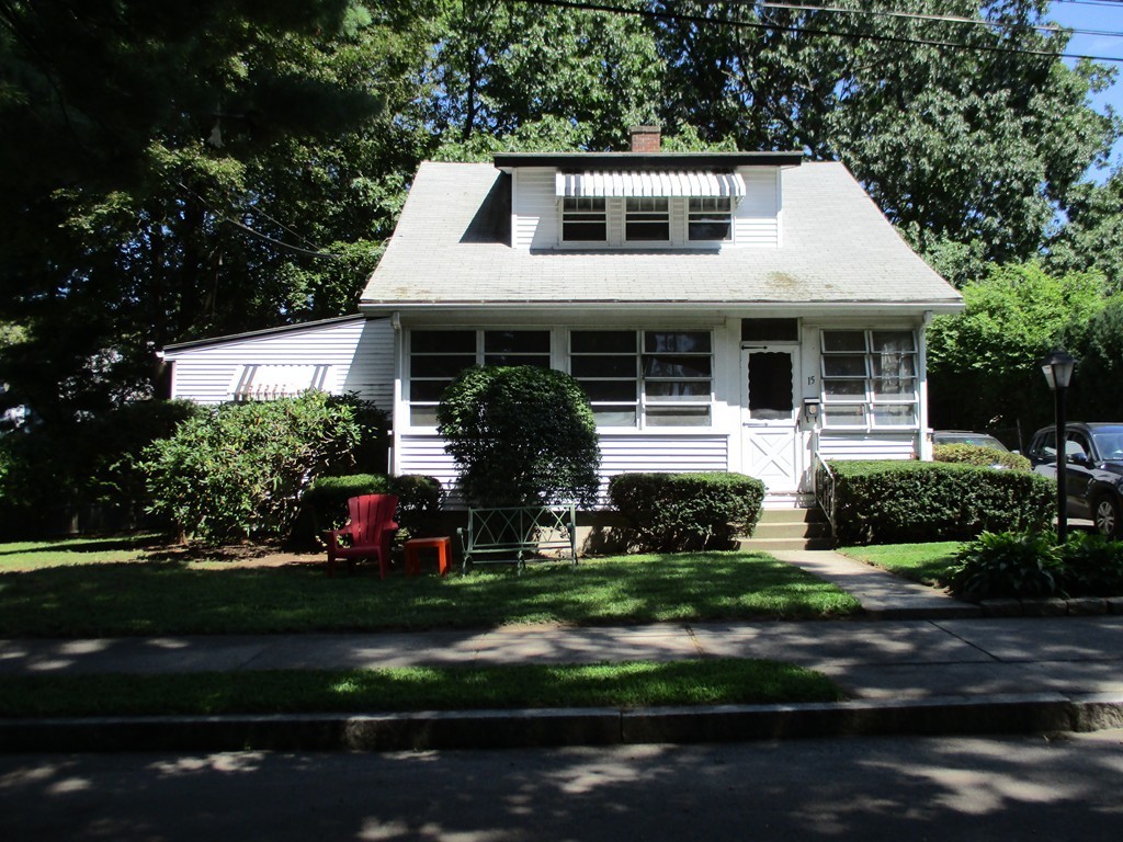 15 Edgewood Road Newton, MA 02465 - Photo 5 of 14 a front view of a house with a garden and plants