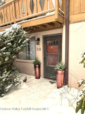 a view of a entryway door of house