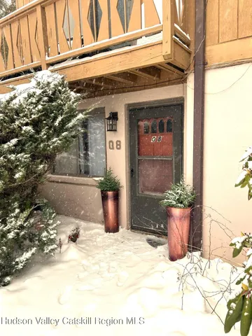 a view of a entryway door of house