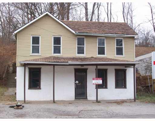 3234 Millers Run Road Cecil, PA 15321 - Photo 1 of 1 Exterior Front. Apartment above Storefront. Work Downstairs Live Upstairs. No Travel Expense !!