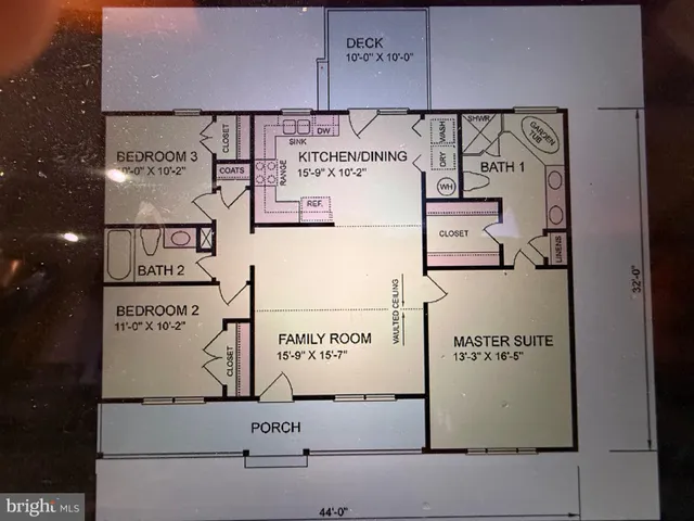 a front view of a house with swimming pool table and chairs