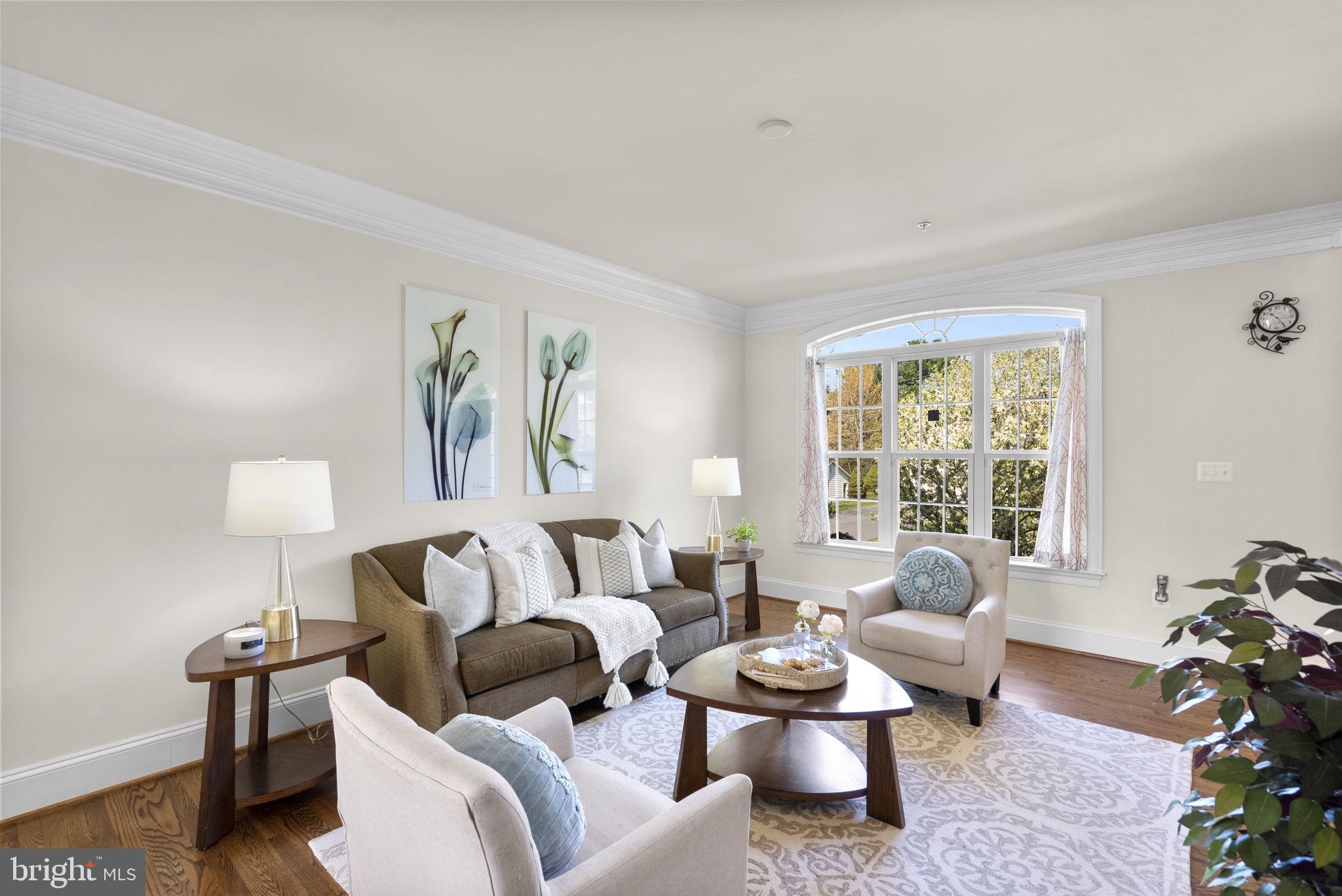 22403 Newcut Road Clarksburg, MD 20871 - Photo 23 of 78 a living room with furniture and a large window
