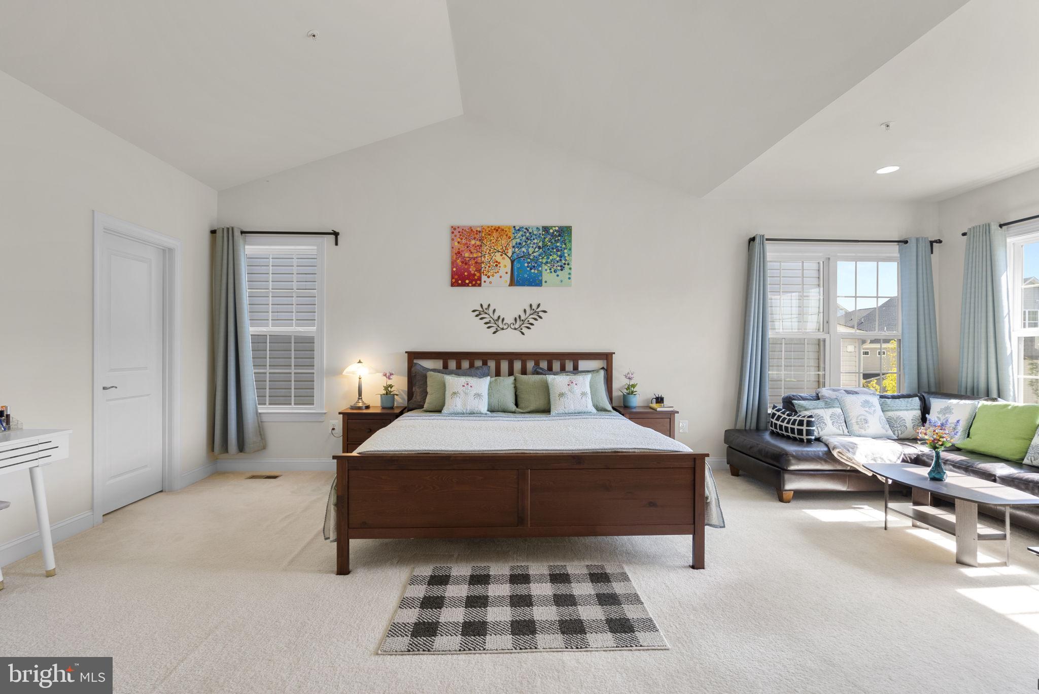 22403 Newcut Road Clarksburg, MD 20871 - Photo 32 of 78 a bedroom with a bed and glass window