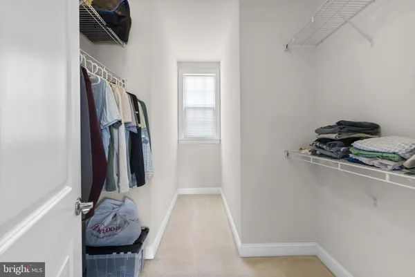 a view of living room with furniture and a piano