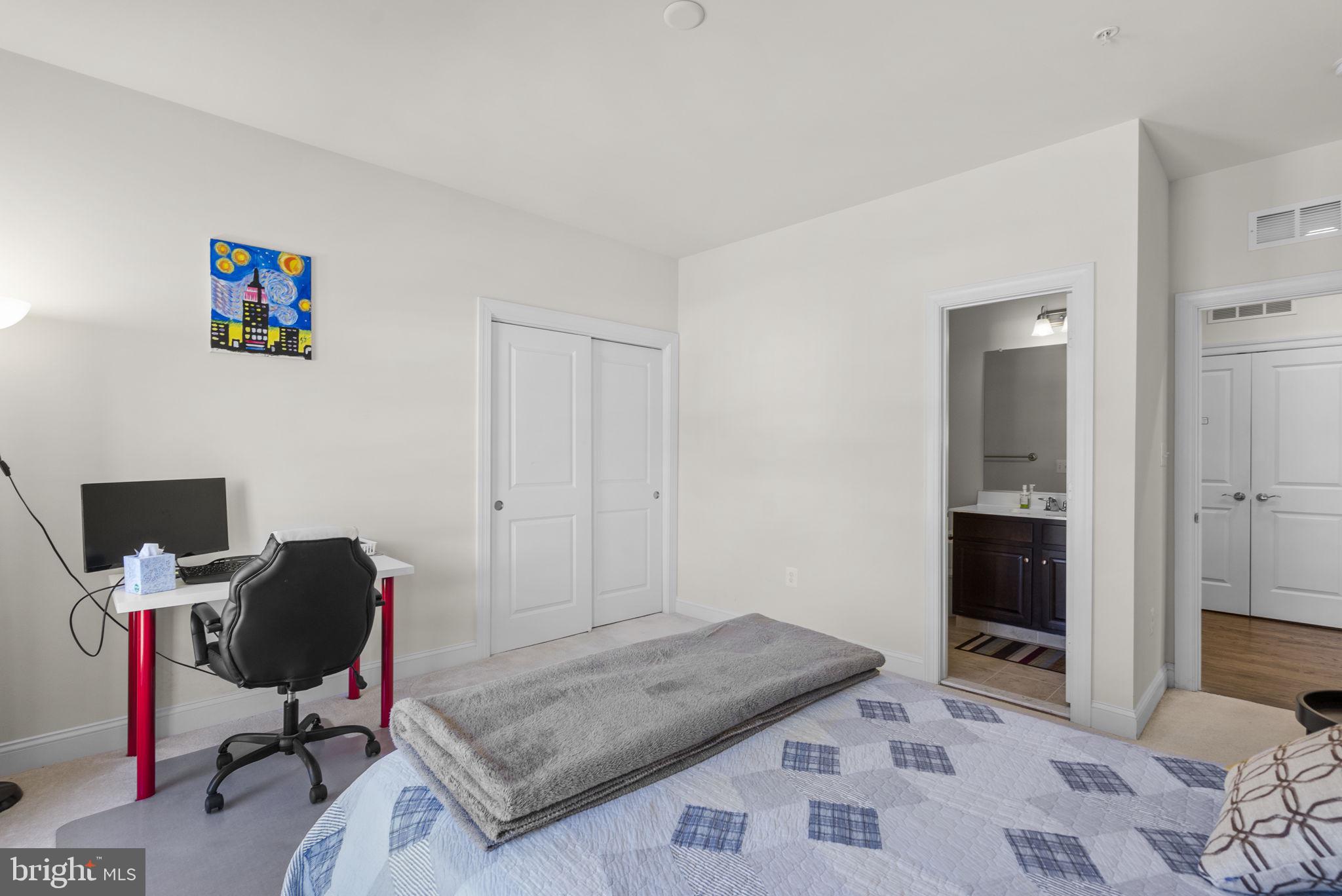 22403 Newcut Road Clarksburg, MD 20871 - Photo 44 of 78 a view of a workspace with furniture and a bedroom