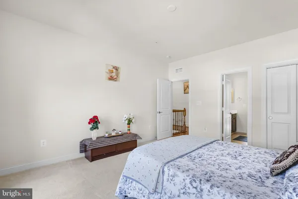 a room with gym equipment and a table