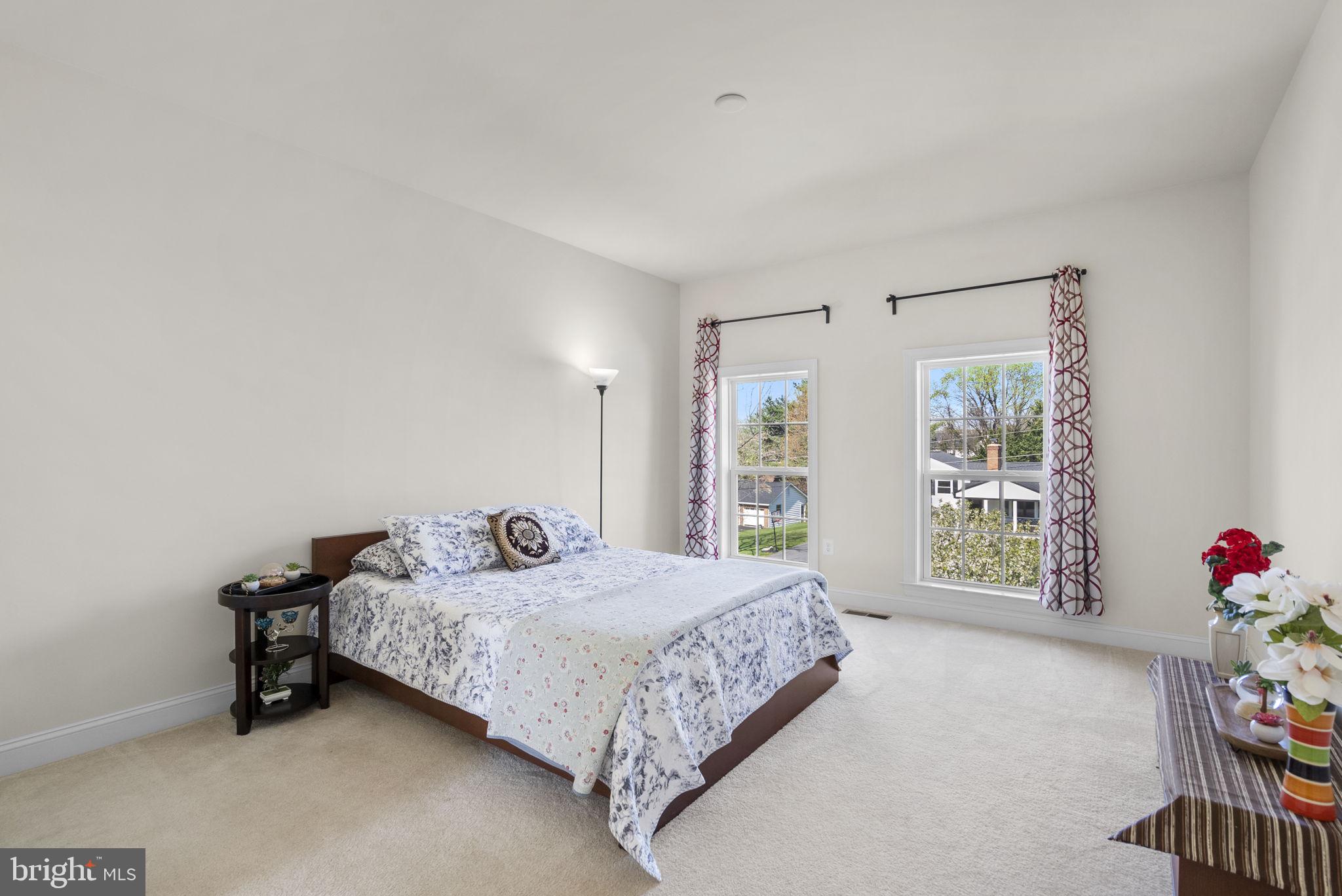 22403 Newcut Road Clarksburg, MD 20871 - Photo 50 of 78 a bedroom with a bed and a window