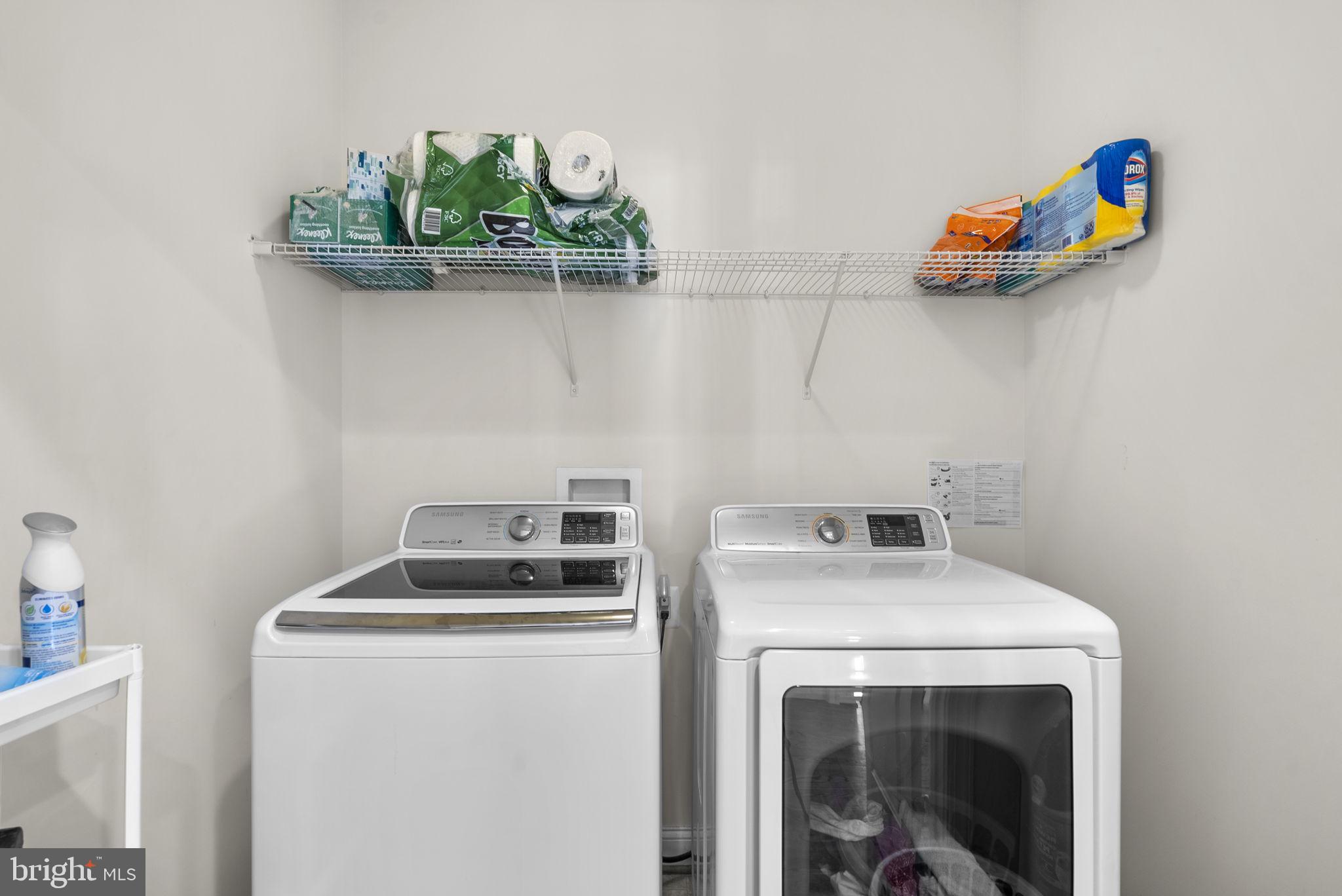 22403 Newcut Road Clarksburg, MD 20871 - Photo 57 of 78 a utility room with dryer and washer