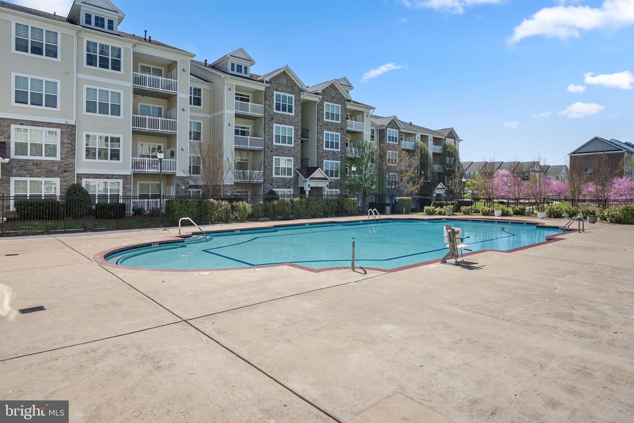 22403 Newcut Road Clarksburg, MD 20871 - Photo 64 of 78 a view of a tall building next to a road