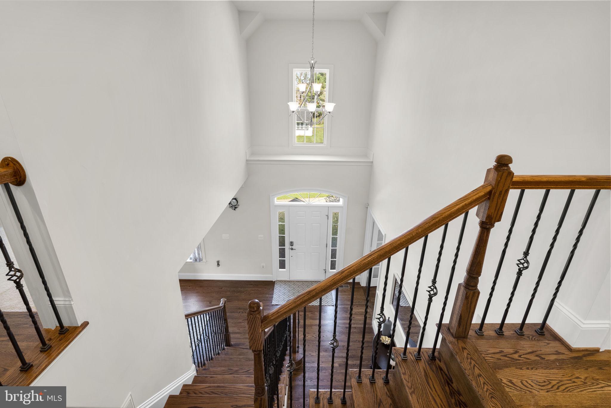 22403 Newcut Road Clarksburg, MD 20871 - Photo 7 of 78 a view of entryway with wooden floor