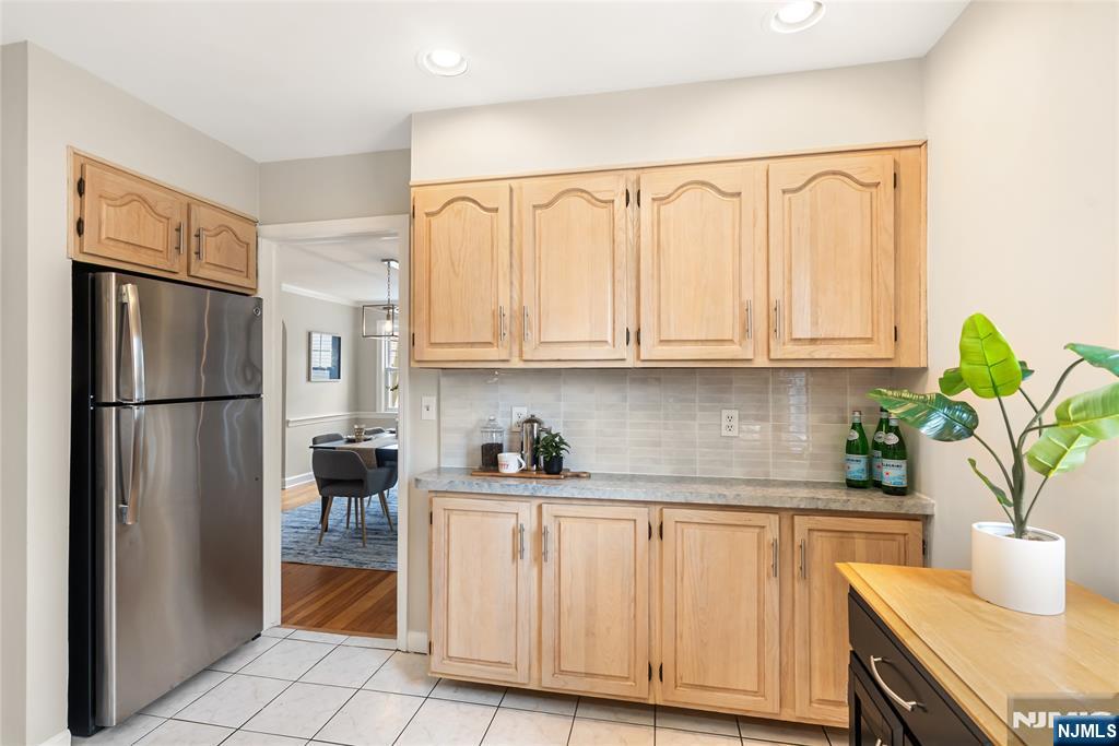 5 Northview Terrace Maplewood, NJ 07040 - Photo 13 of 47 a kitchen with white cabinets and counter space