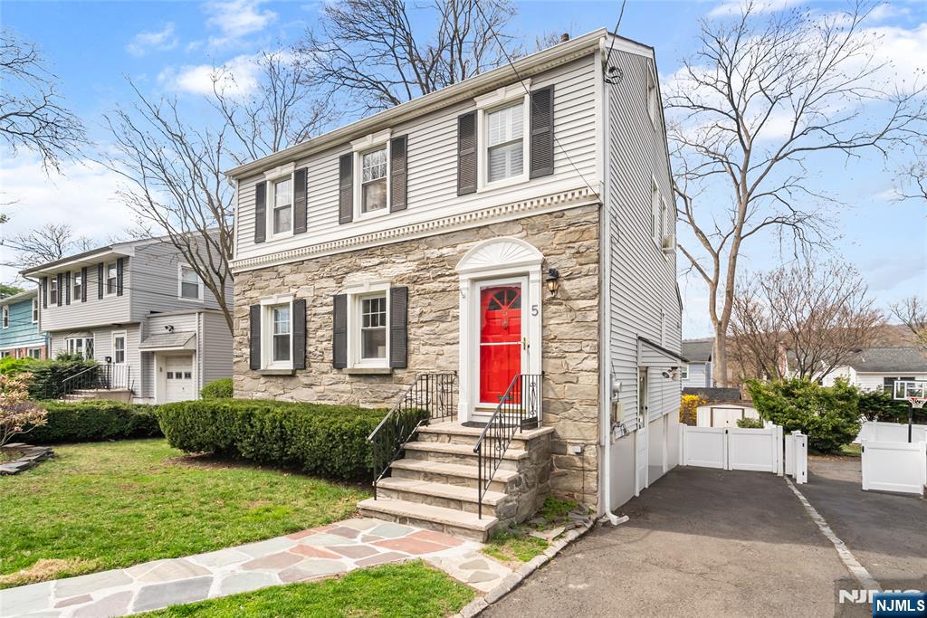 5 Northview Terrace Maplewood, NJ 07040 - Photo 2 of 47 a front view of a house with garden