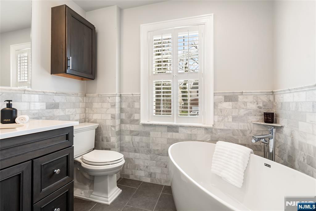 5 Northview Terrace Maplewood, NJ 07040 - Photo 21 of 47 a bathroom with a sink a toilet and bathtub