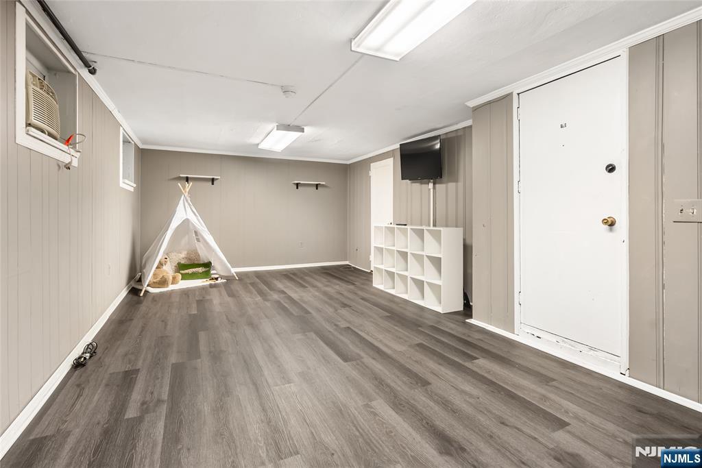 5 Northview Terrace Maplewood, NJ 07040 - Photo 31 of 47 a view of empty room with wooden floor and window