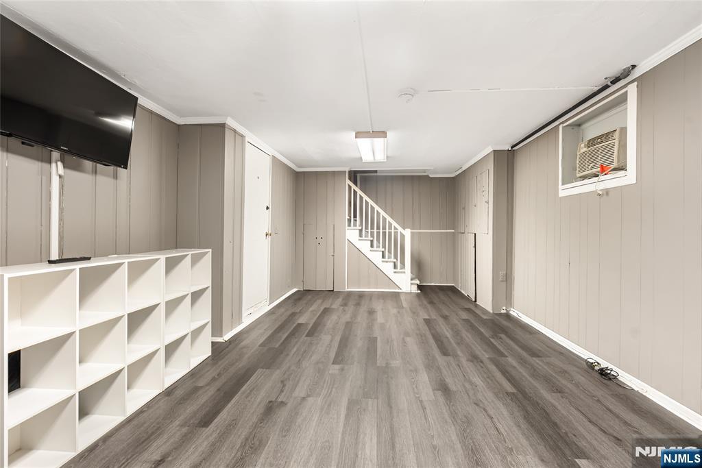 5 Northview Terrace Maplewood, NJ 07040 - Photo 32 of 47 a view of an empty room with wooden floor and a window