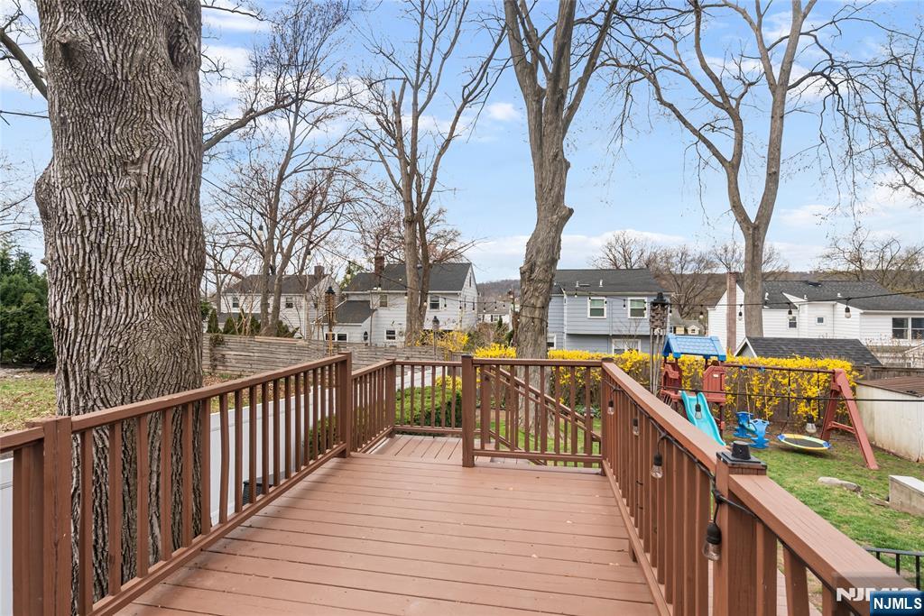 5 Northview Terrace Maplewood, NJ 07040 - Photo 36 of 47 a view of a balcony with wooden fence and trees