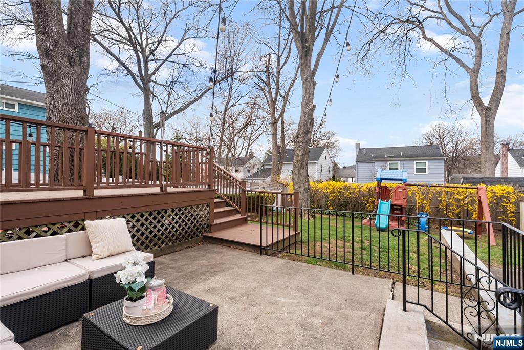 5 Northview Terrace Maplewood, NJ 07040 - Photo 39 of 47 a view of a deck with couches table and chairs