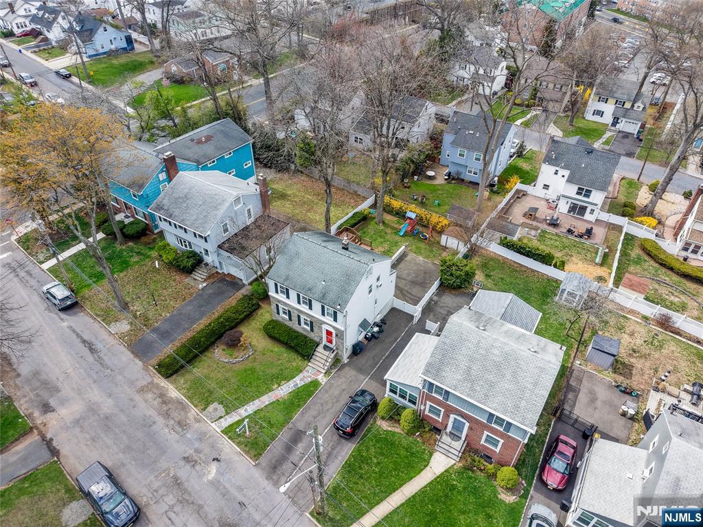 5 Northview Terrace Maplewood, NJ 07040 - Photo 47 of 47 an aerial view of a house with a garden and swimming pool