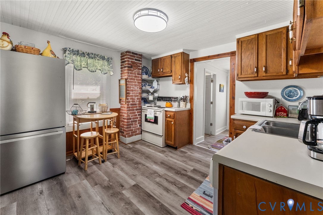738 Bowlers Road Center Cross, VA 22437 - Photo 14 of 25 Light & bright eat-in Kitchen with luxury vinyl fl