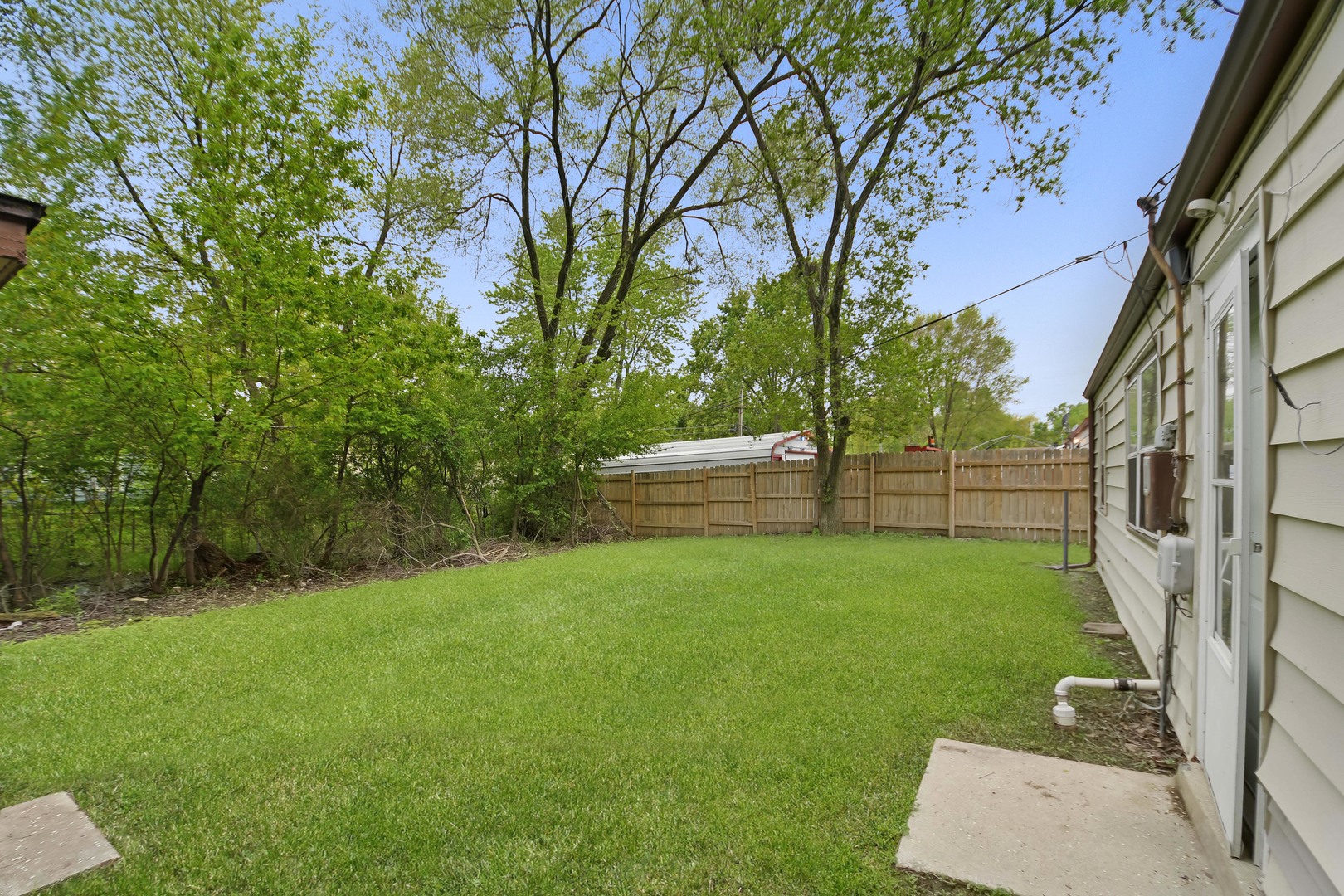 116 Louis Road Joliet, IL 60433 - Photo 11 of 12 a view of yard with green space