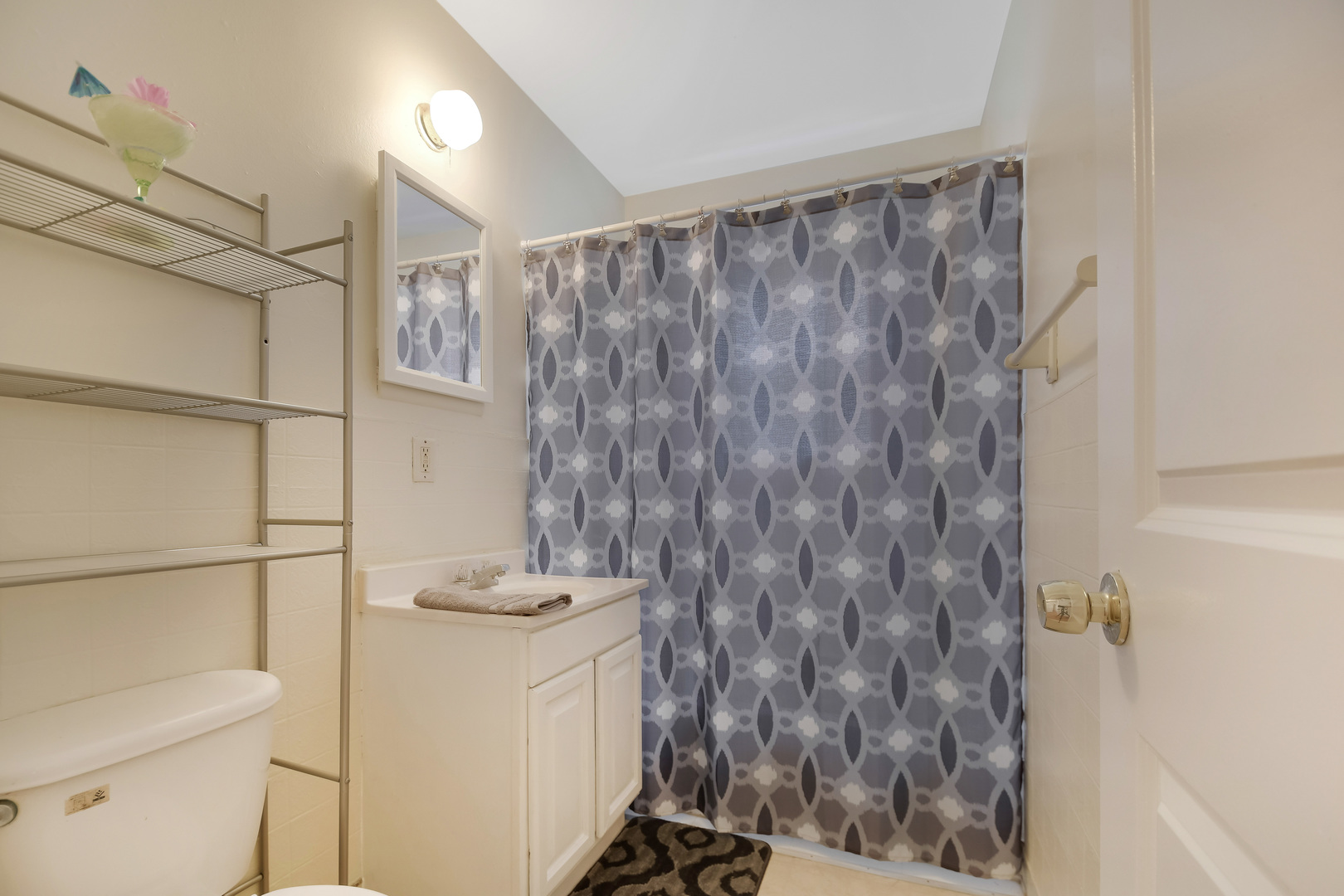 116 Louis Road Joliet, IL 60433 - Photo 9 of 12 a bathroom with a granite countertop sink a toilet and shower