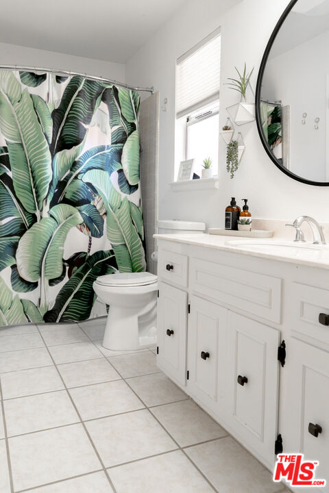 56434 Cobalt Road Yucca Valley, CA 92284 - Photo 30 of 75 a bathroom with a sink mirror and toilet