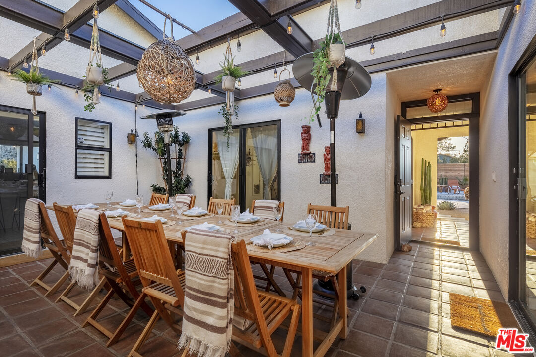 56434 Cobalt Road Yucca Valley, CA 92284 - Photo 31 of 75 a view of a dining room with furniture