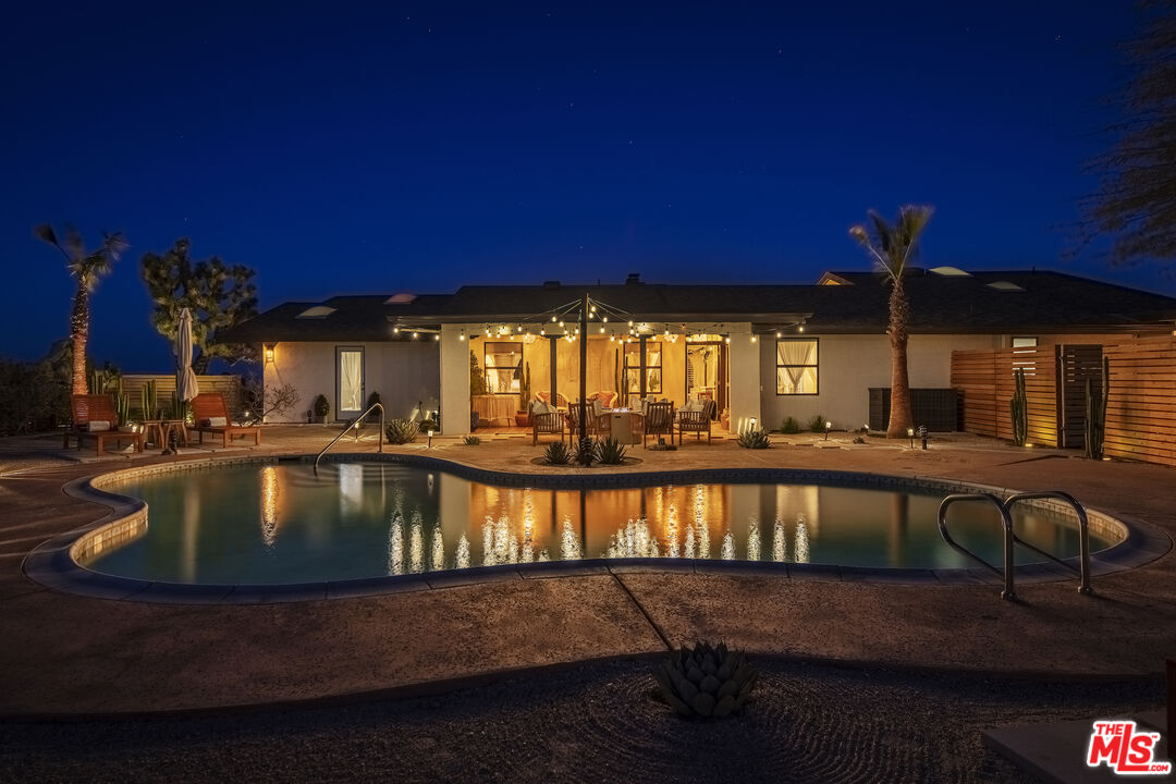 56434 Cobalt Road Yucca Valley, CA 92284 - Photo 7 of 75 a view of swimming pool with seating space
