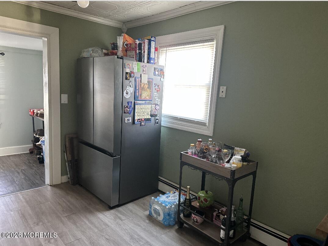 284 Washington Street Keyport, NJ 07735 - Photo 12 of 23 a kitchen with a refrigerator and a window