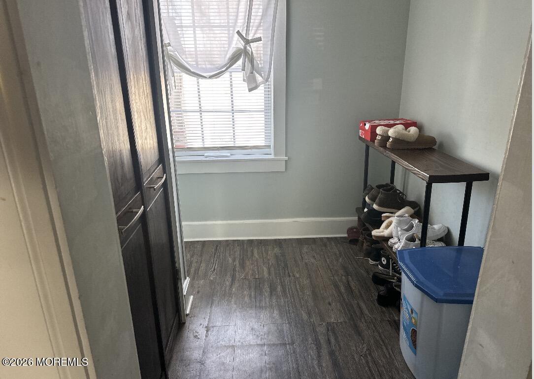 284 Washington Street Keyport, NJ 07735 - Photo 17 of 23 a room with wooden floor and windows