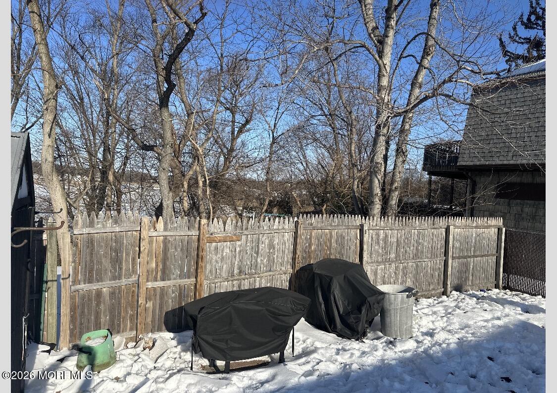 284 Washington Street Keyport, NJ 07735 - Photo 21 of 23 a view of a backyard with couches and potted plants