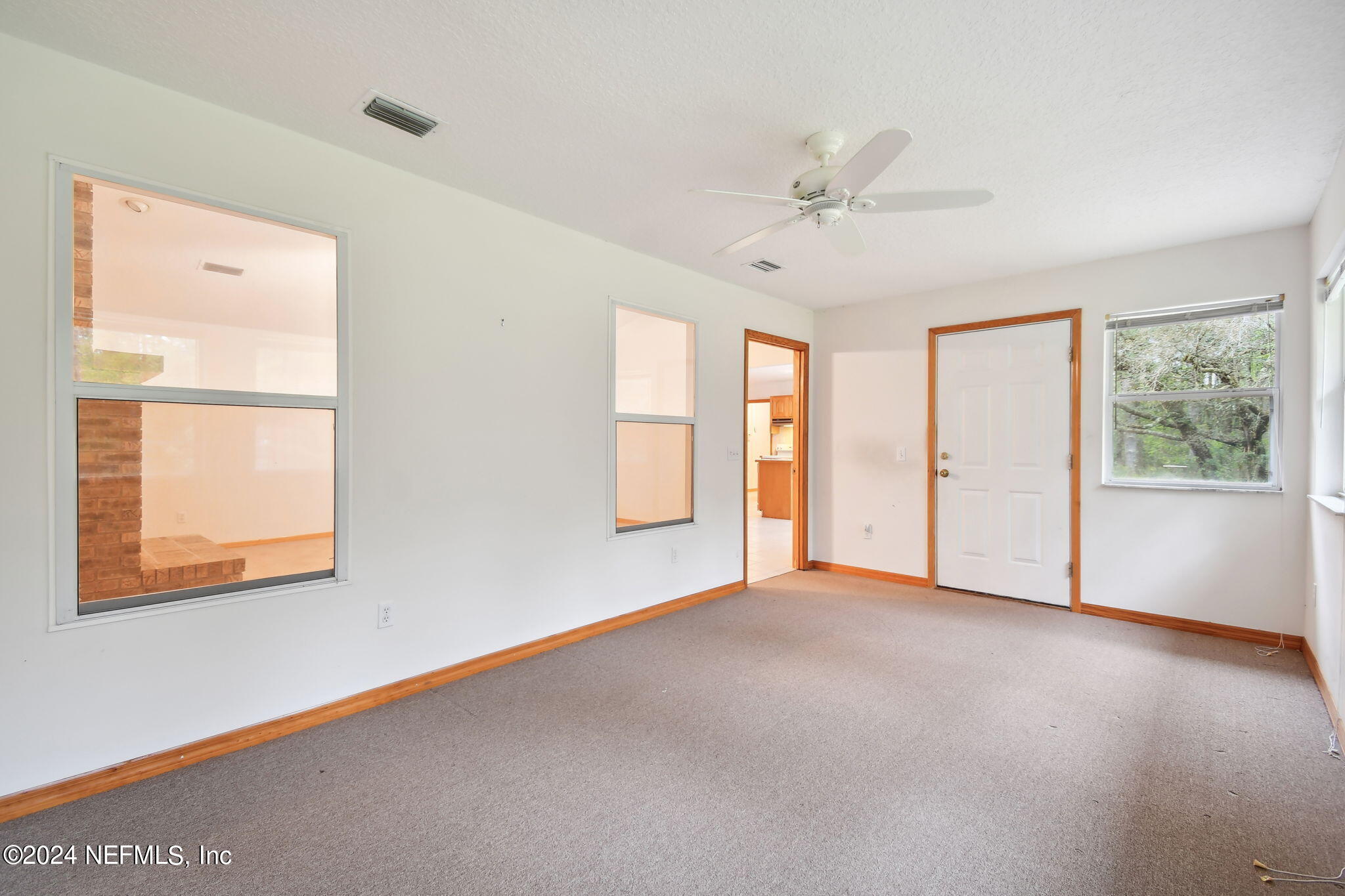 36068 J W Elliott Road Callahan, FL 32011 - Photo 15 of 54 a view of an empty room with a window