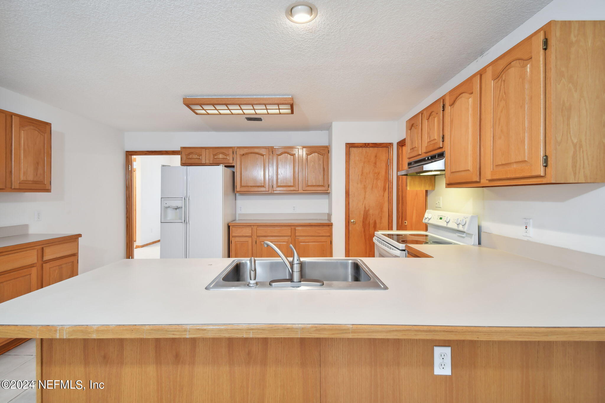 36068 J W Elliott Road Callahan, FL 32011 - Photo 19 of 54 a bedroom with furniture and large window