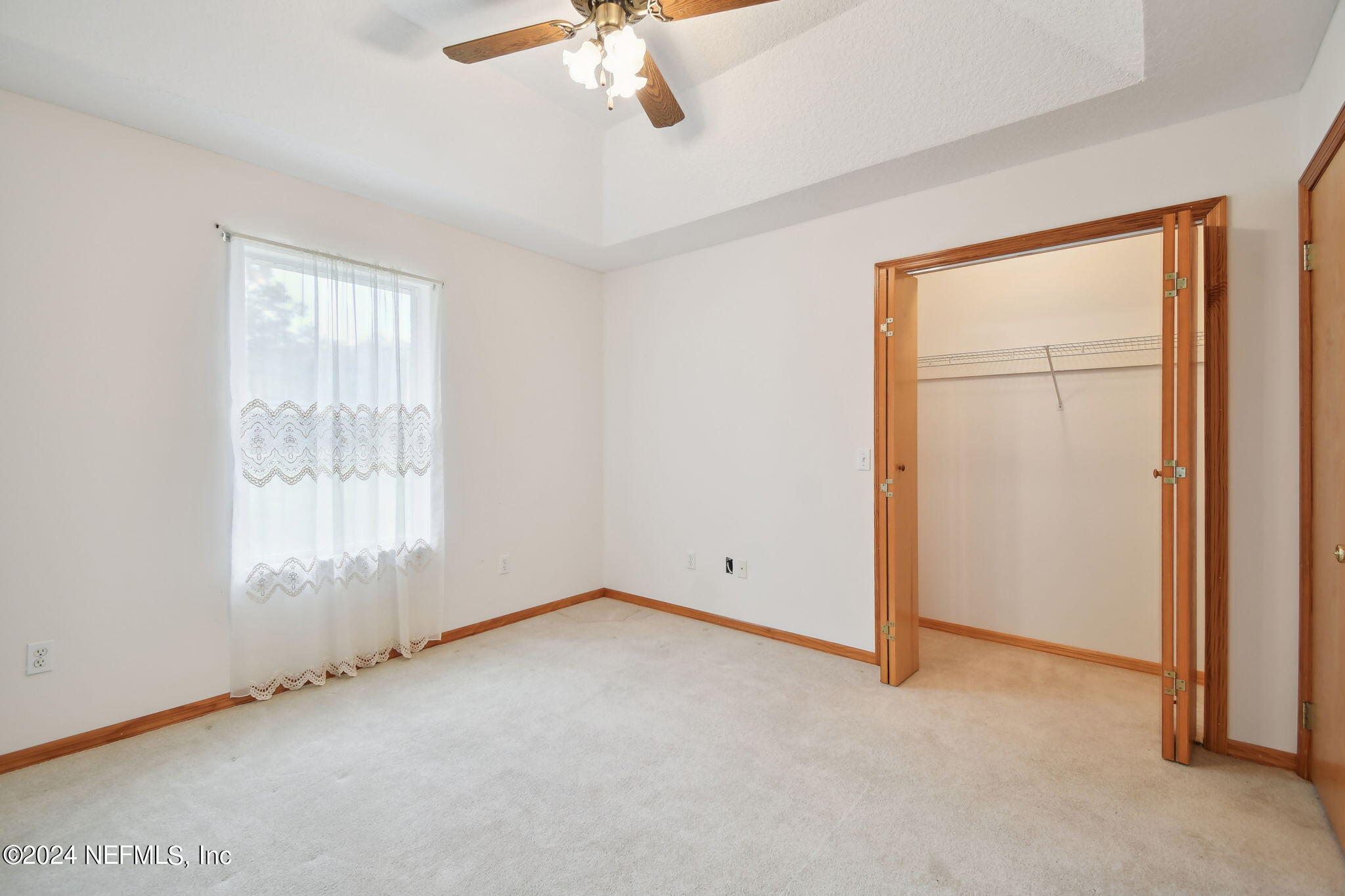 36068 J W Elliott Road Callahan, FL 32011 - Photo 31 of 54 an empty room with a window