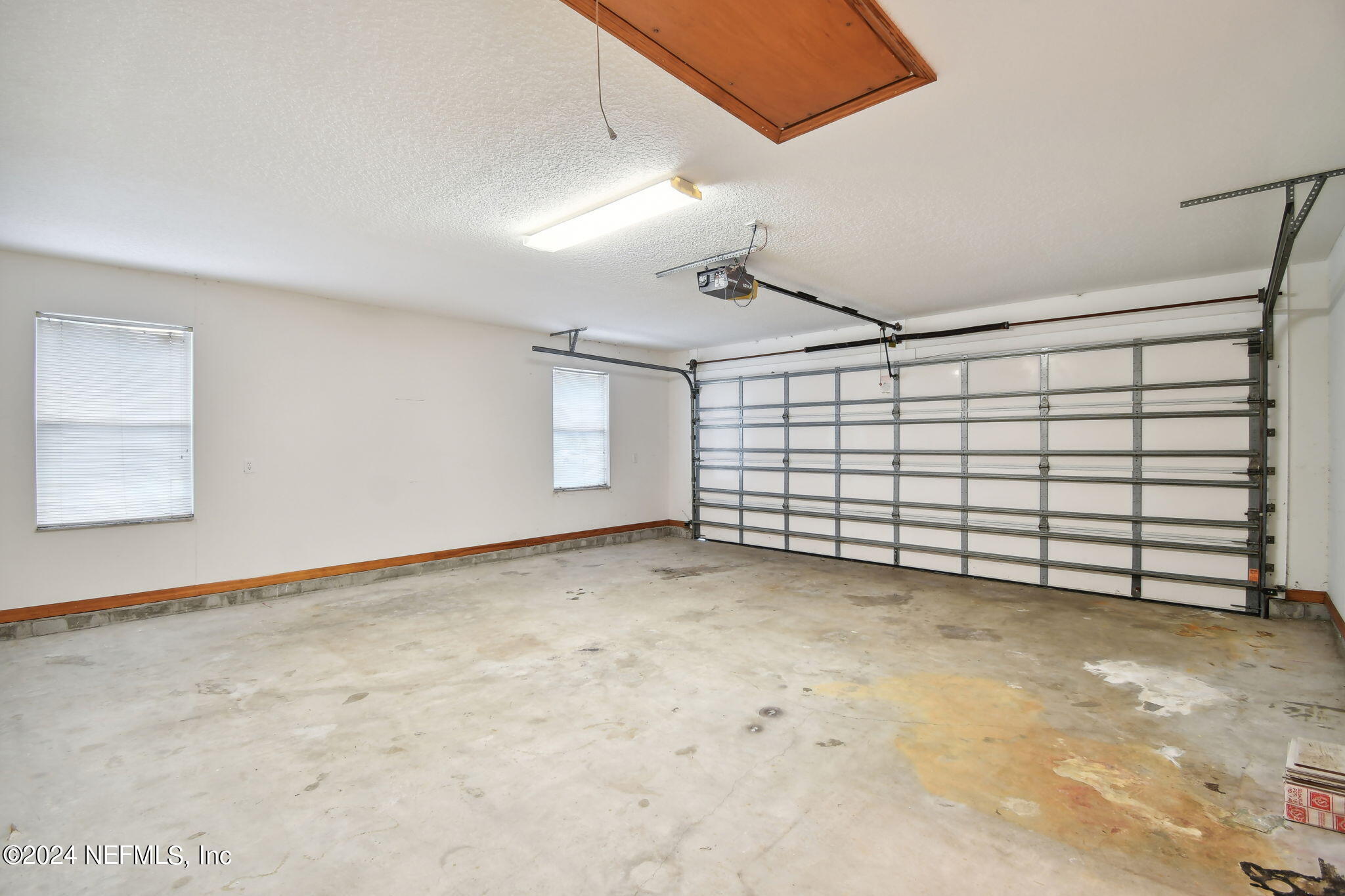 36068 J W Elliott Road Callahan, FL 32011 - Photo 44 of 54 an empty room with windows