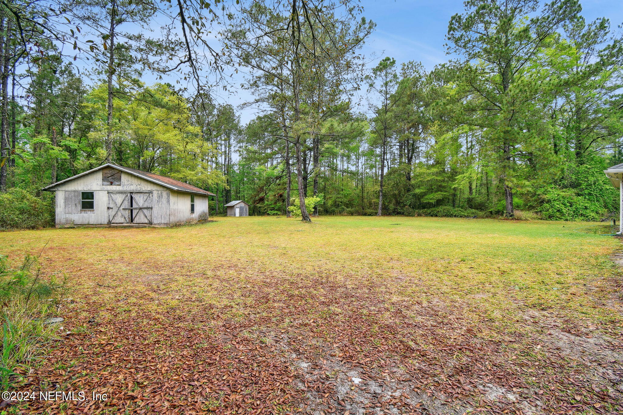 36068 J W Elliott Road Callahan, FL 32011 - Photo 5 of 54 a front view of house with yard and green space