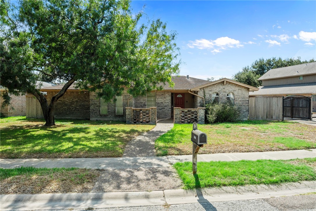 5121 Moultrie Drive Corpus Christi, TX 78413 - Photo 1 of 13 a view of a house with a yard