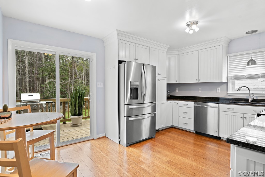 3125 Gregwood Road Midlothian, VA 23112 - Photo 12 of 31 a kitchen with stainless steel appliances granite countertop a refrigerator and a stove top oven