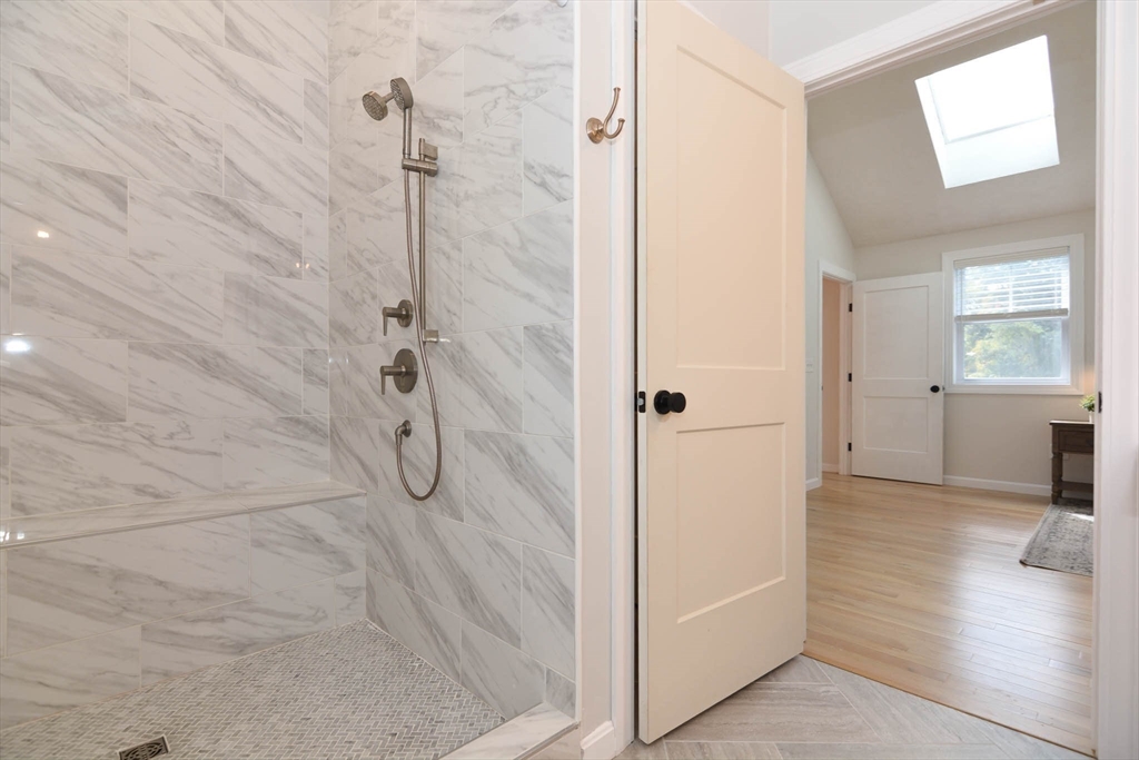 57 Parham Road Tyngsborough, MA 01879 - Photo 20 of 42 a bathroom with a granite countertop shower