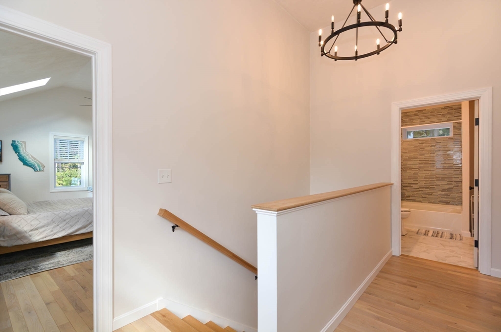57 Parham Road Tyngsborough, MA 01879 - Photo 22 of 42 a view of a room with wooden floor and windows