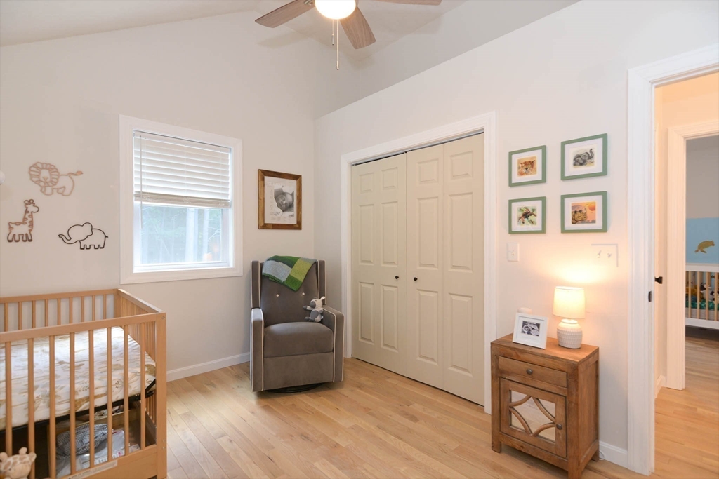57 Parham Road Tyngsborough, MA 01879 - Photo 27 of 42 a living room with furniture and a window