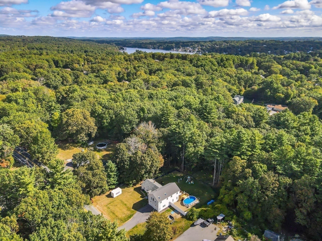57 Parham Road Tyngsborough, MA 01879 - Photo 35 of 42 a aerial view of a house with a yard