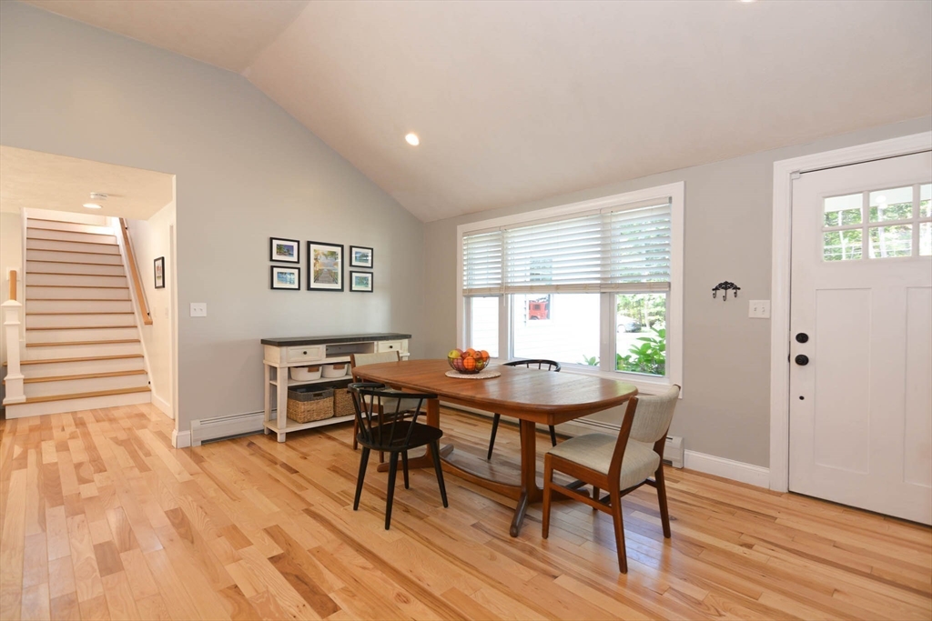 57 Parham Road Tyngsborough, MA 01879 - Photo 7 of 42 a view of a dining room with furniture and wooden floor