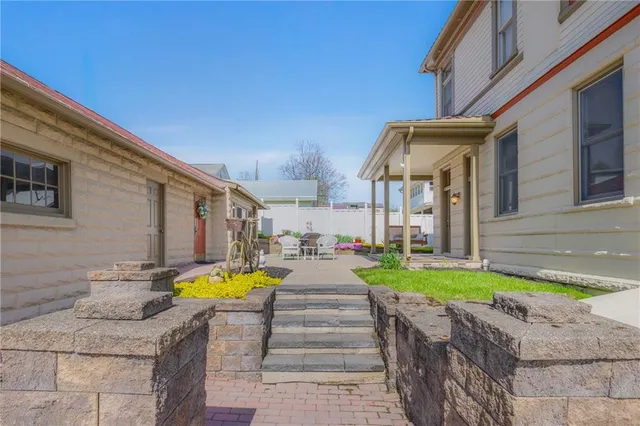 a front view of a house with patio