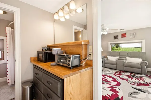 a kitchen with a refrigerator and countertop
