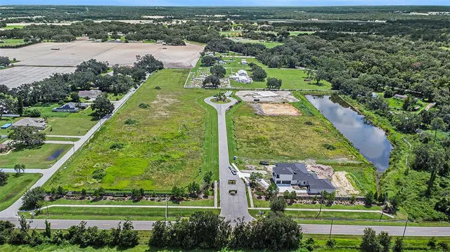 an aerial view of a city with lots of residential buildings
