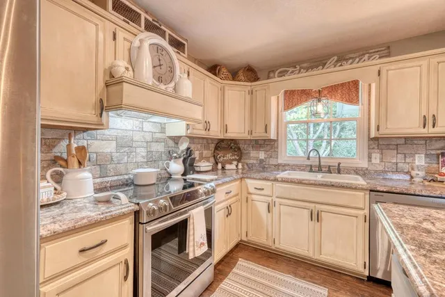 a view of a dining table chairs and chandelier