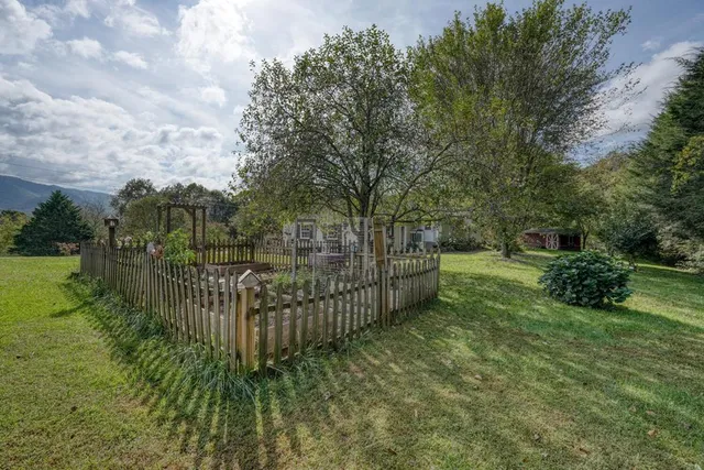 a view of a chair and table in the balcony