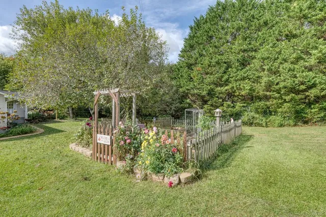 a view of a balcony with wooden floor